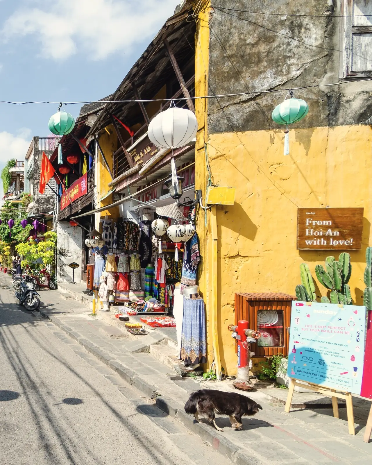 Lanterns and yellow shophouses in Hoi An